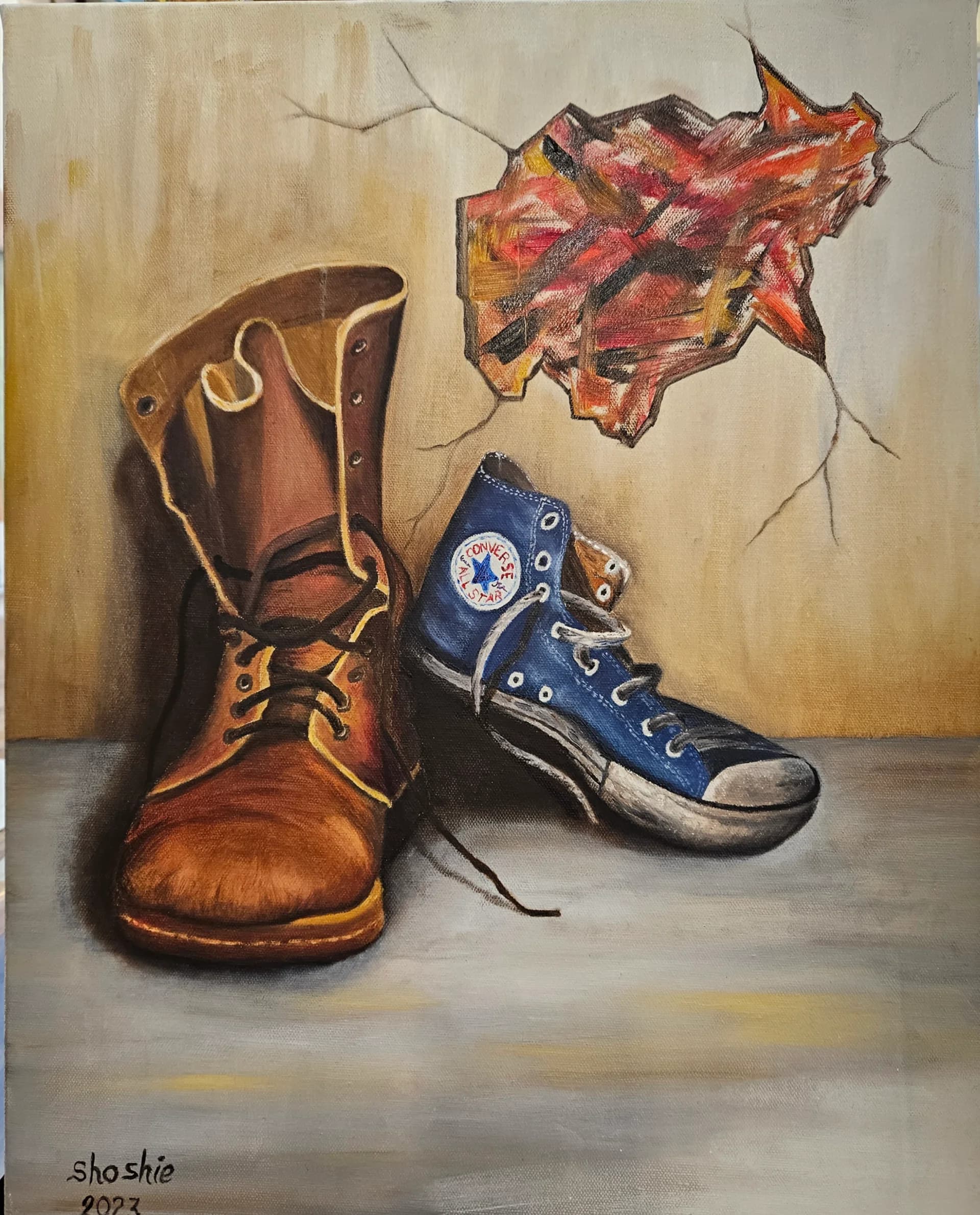 Worn Military Boot and a Sneaker