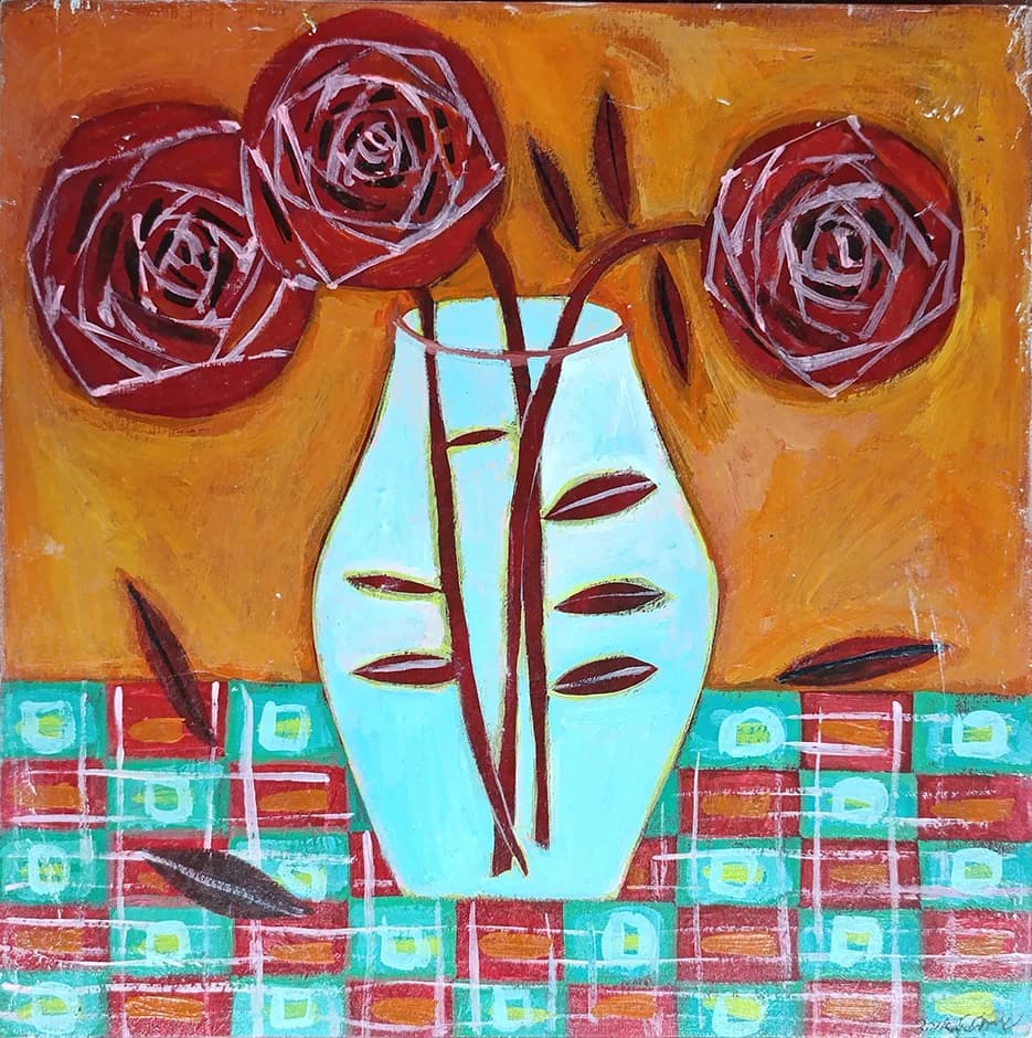 A vase with red roses