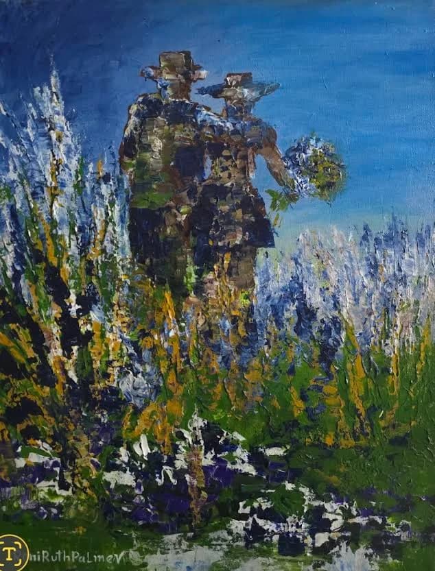 Couple walk in a field of wildflowers