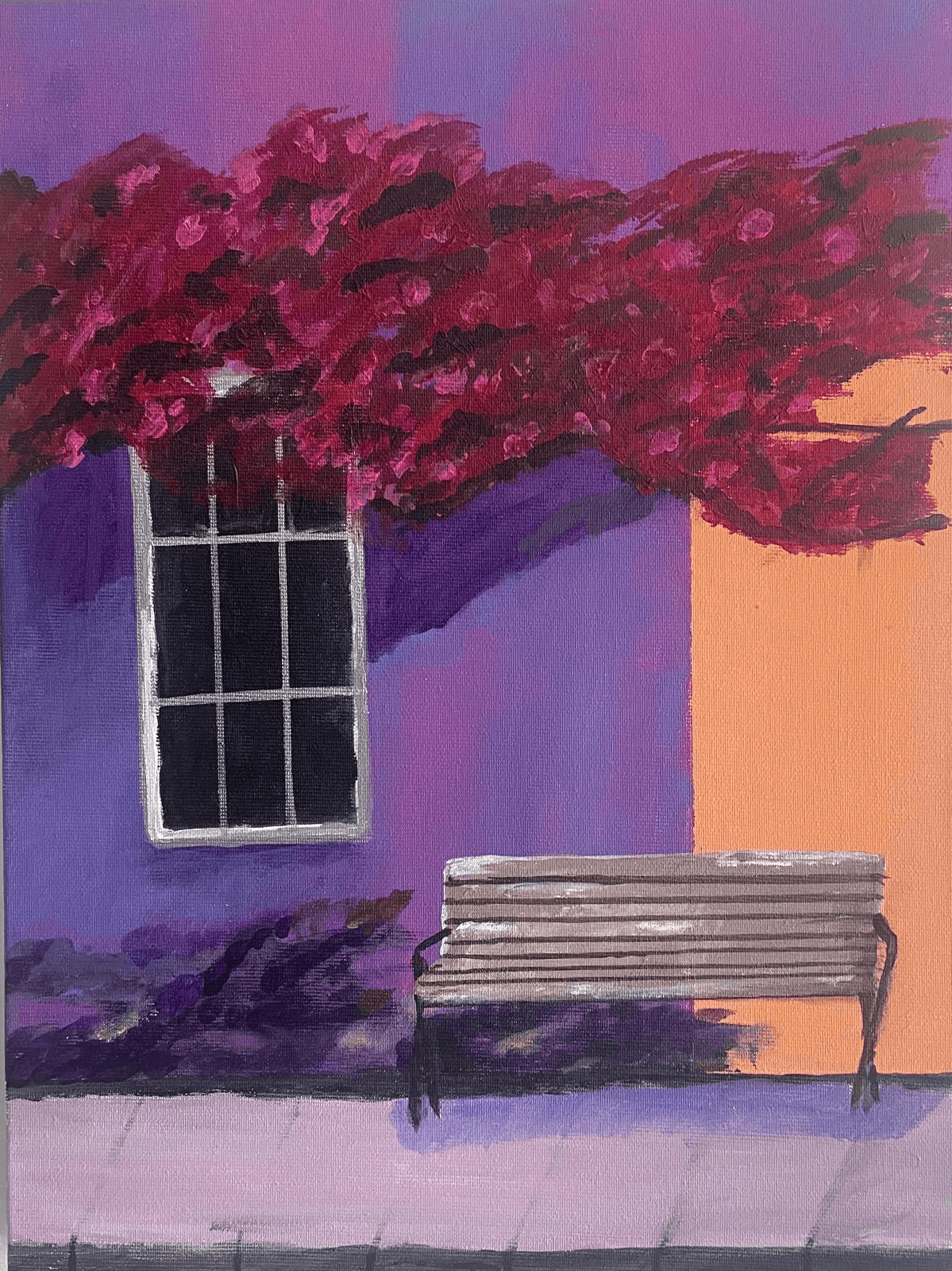A bench and a house