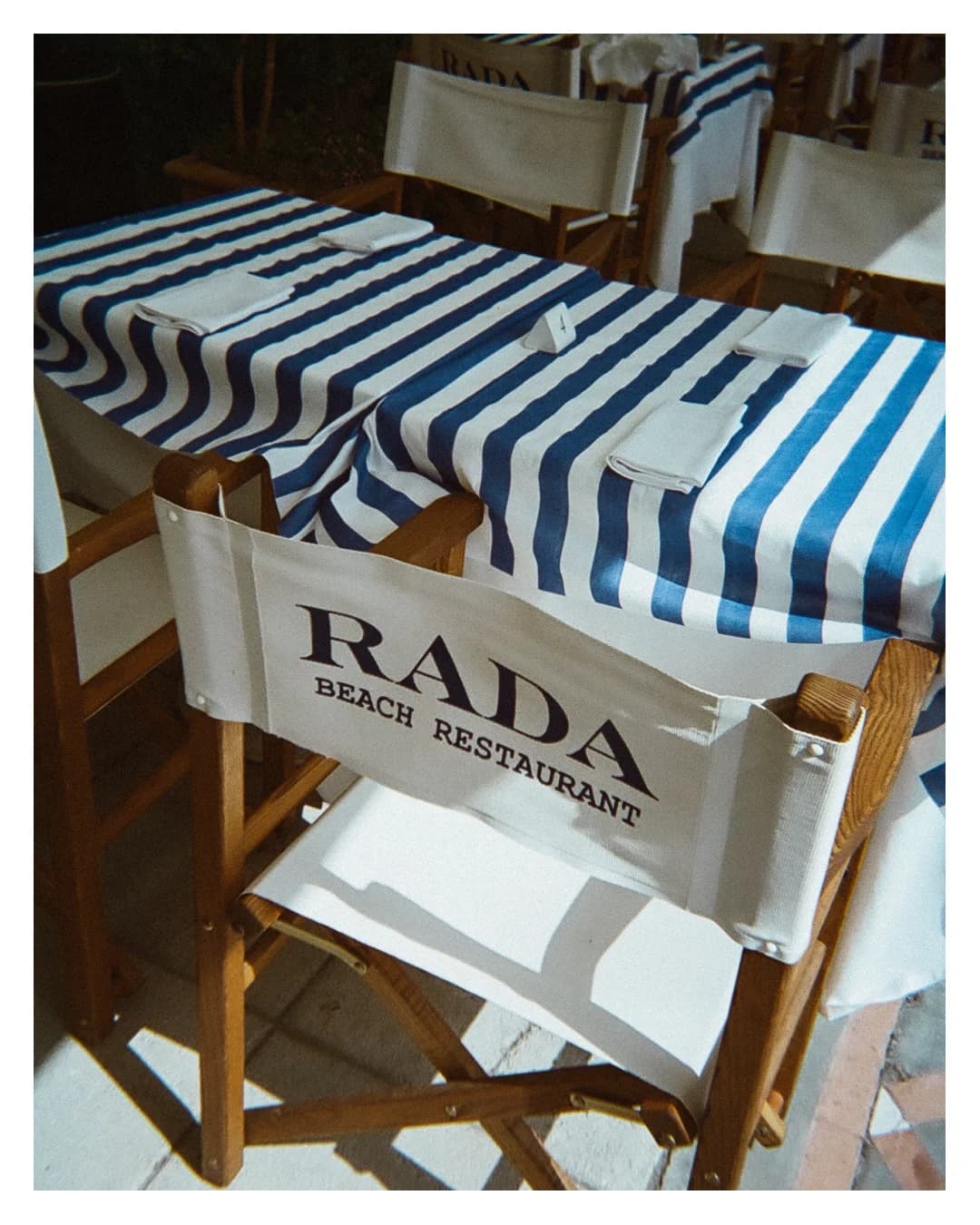 Blue Tables, Empty Chairs