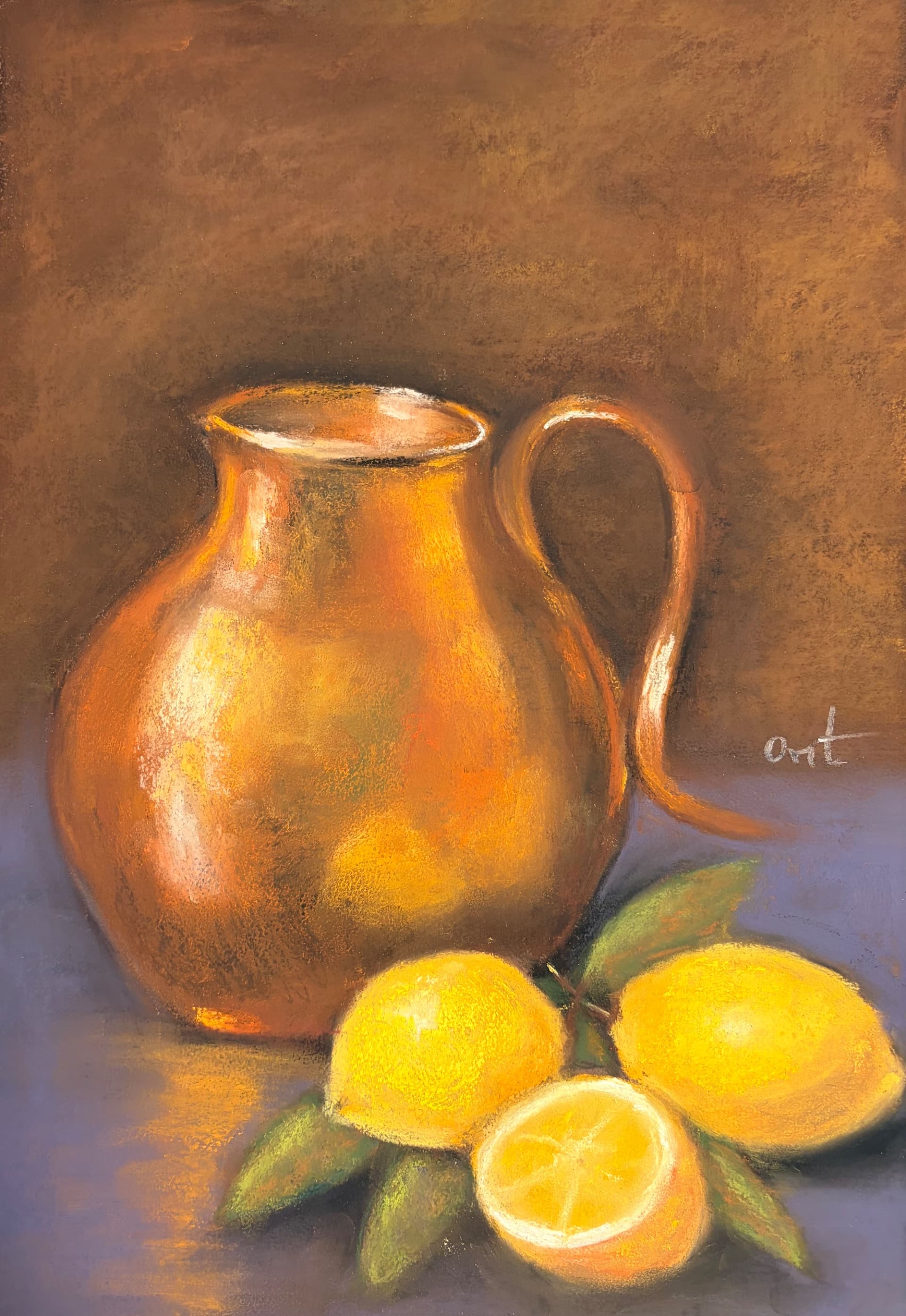 Copper vase and lemons