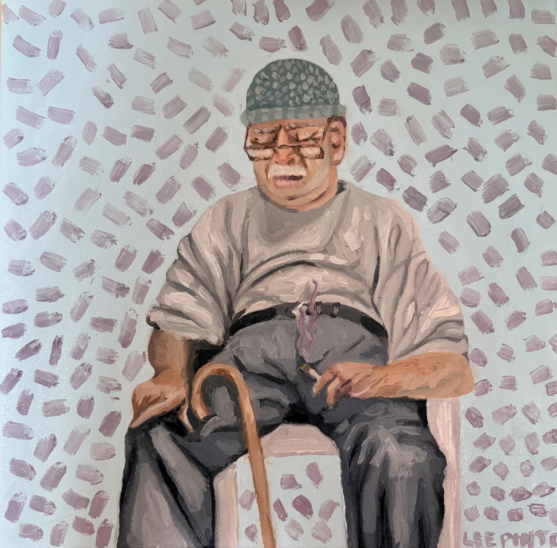 A man siting with a cane